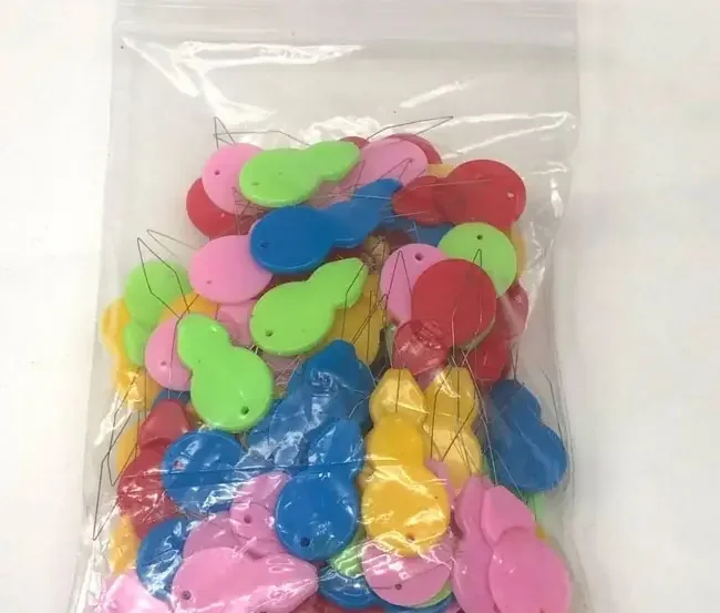 Нитковдівач пластиковий 5шт.